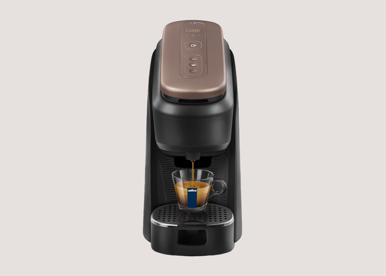Tablì macchina caffè davanti